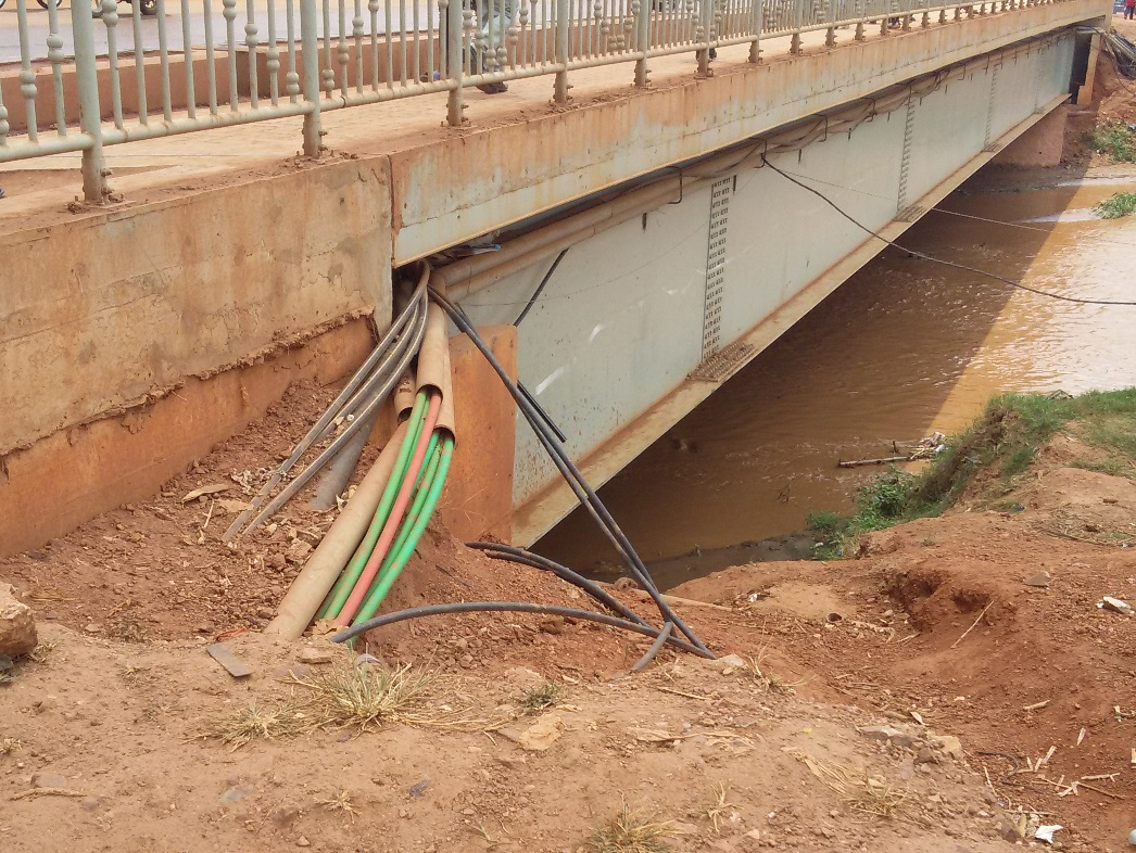 Manhole and fiber optic cables